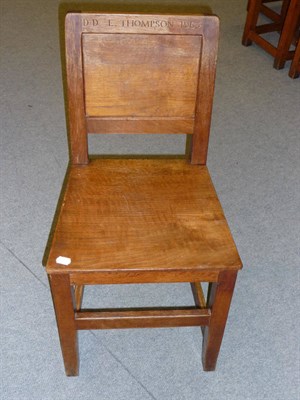 Lot 1718 - Six Robert "Mouseman" Thompson Oak Panel Back and Seat Chairs, on square section legs, joined...