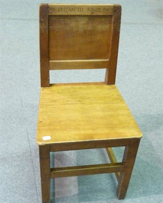 Lot 1721 - Six Robert "Mouseman" Thompson Oak Panel Back and Seat Chairs, on square section legs, joined...