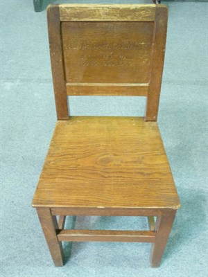 Lot 1722 - A Set of Four Robert "Mouseman" Thompson Oak Panel Back and Seat Chairs", on square section...