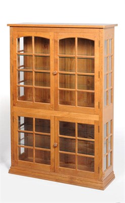 Lot 1724 - A Colin "Beaverman" Almack Panelled and Glazed Oak Display Cabinet, the upper section with two...