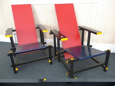 Lot 1734 - A Pair of Modern Cassina Red/Blue Chairs, designed by Gerrit Rietveld, painted solid beechwood...