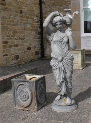 Lot 1748 - A Modern Lead Fountain, modelled as a water carrier, 110cm high; and A Lead Square Planter (2)