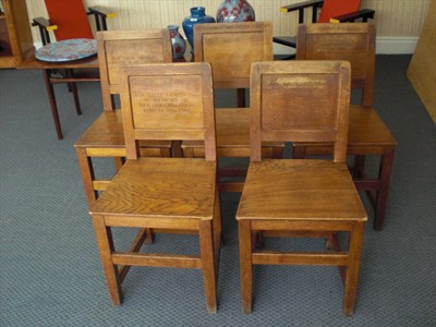 Lot 1722B - A Set of Six Robert "Mouseman" Thompson Oak Panel Back and Seat Chairs, on square section legs,...