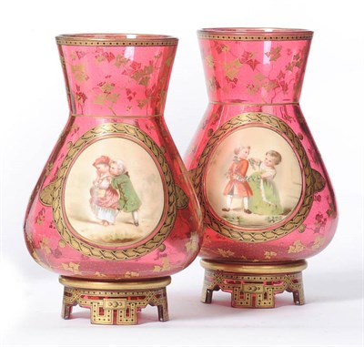 Lot 2 - A Pair of Ruby Glass, Painted and Parcel Gilt Vases, Bohemia, circa 1870, of Islamic...