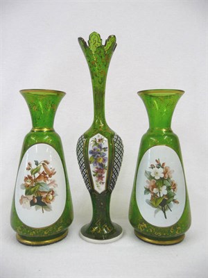 Lot 5 - A Pair of Emerald Green Glass, Painted and Parcel Gilt Vases, Bohemia, circa 1870, the short...