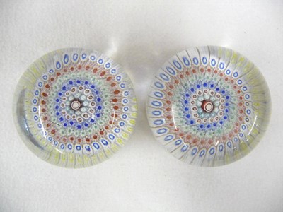 Lot 21 - A Matched Pair of Stourbridge Millefiori Paperweights, circa 1850-60, each with pale pink,...