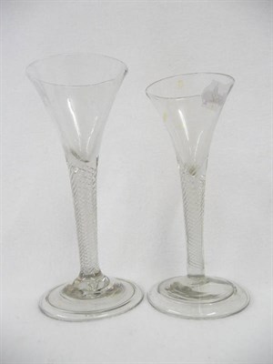 Lot 44 - A Wine Glass, circa 1750, the one piece drawn trumpet bowl with multiple spiral air twist stem,...