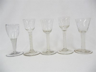 Lot 47 - A Group of Five Wine Glasses, circa 1760, each with different double series opaque twist stem,...