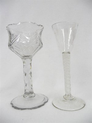 Lot 49 - A Wine Glass, circa 1765, the rounded funnel bowl on a double series opaque twist stem comprising a