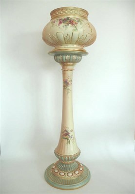 Lot 74 - A Royal Worcester Blush Ivory Porcelain Jardiniere on Pedestal, 1899, the cauldron shape jardiniere