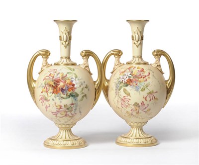 Lot 76 - A Pair of Royal Worcester Blush Ivory Two-Handled Pedestal Vases, 1901, each with strapwork...