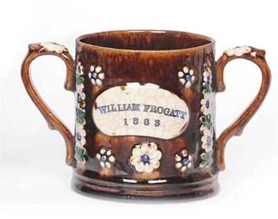 Lot 87 - A Measham Type Two-Handled Mug, William Frogatt, 1883, frontally applied with kidney shape...