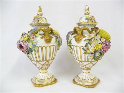 Lot 96 - A Pair of Floral Encrusted Porcelain Pedestal Vases and Covers, John Bevington, circa 1840,...