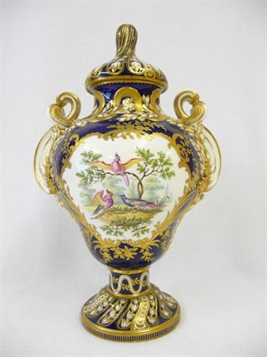 Lot 100 - An English Porcelain Rococo Vase and Cover, probably Coalport, circa 1830, of ogee outlined...