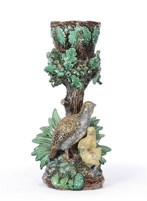 Lot 137 - A Continental Majolica Pottery Game Bird Cache Pot on Stand, circa 1875, the cylindrical cache...