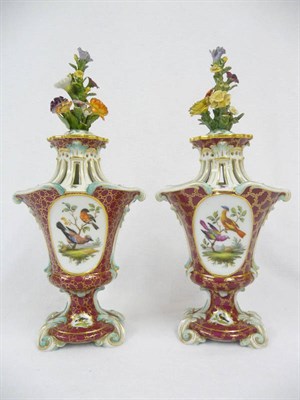 Lot 143 - A Pair of Meissen Encrusted Porcelain Ornithological Vases and Covers, circa 1880, in rococo style