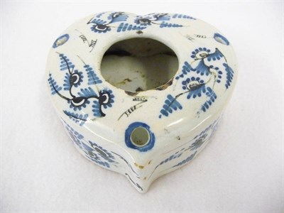 Lot 146 - A Continental Tin Glaze Pottery Heart Shape Inkwell, painted with stylised fronded leaves in...