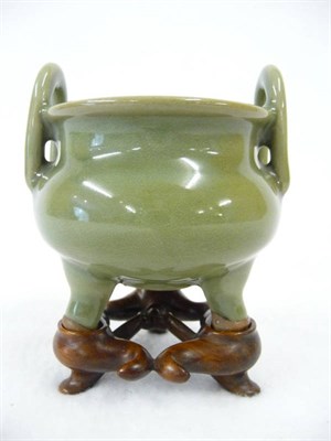 Lot 160 - A Small Longquan Celadon Tripod Censer, Ming Dynasty, 16th century, of rounded form below a...