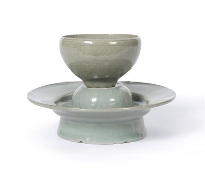 Lot 161 - A Celadon Cup and Stand, Koryo Dynasty, Korea (918-1392), stoneware with celadon glaze, cup and...