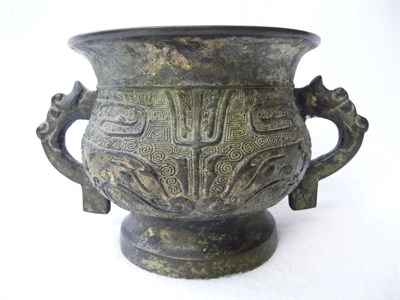 Lot 165 - A Chinese Bronze Two-Handled Vessel in Archaic Style, Qing Dynasty, of cauldron form, with...