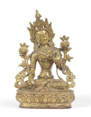 Lot 170 - A Nepalese Gilt Copper Figure of Padmapani, probably 19th century, seated in meditation on a...