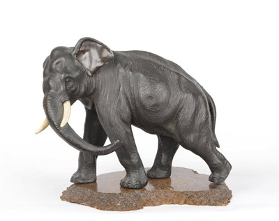 Lot 171 - A Japanese Bronze and Ivory Mounted Elephant, Meiji Period (1868-1912), on all fours and...