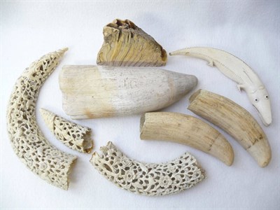 Lot 177 - Two Similar Carved and Pierced Ivory Small Tusks, probably Canton, circa 1850, each of openwork...