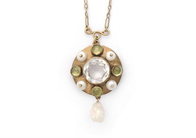 Lot 184 - An Arts and Crafts Rock Crystal, Peridot and Pearl Pendant on Chain, the central round cut rock...