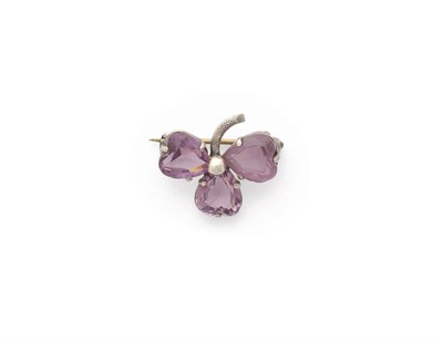 Lot 188 - An Art Nouveau Amethyst and Silver Brooch, by Charles Horner, 1905, three heart shaped amethysts in