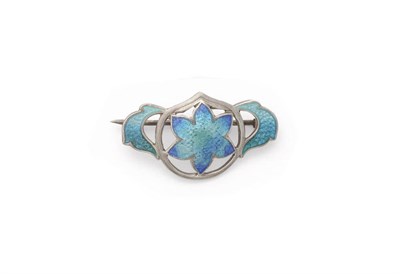 Lot 190 - An Art Nouveau Enamelled Silver Brooch, James Fenton, 1908, a six pointed form enamelled in...