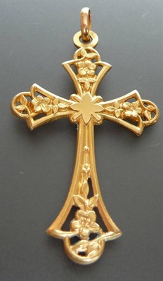 Lot 191 - An Art Nouveau Style Cross, of pierced form with floral and leaf motifs, measures 2.5cm by 4.5cm.