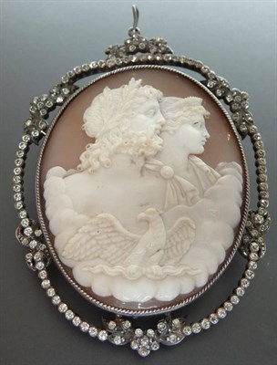 Lot 198 - A Cameo Brooch, the oval shell cameo carved with the portraits of two classical figures and an...