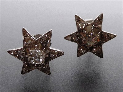 Lot 201 - A Pair of Victorian Diamond Star Shaped Stud Earrings, the old cut diamonds in central raised...