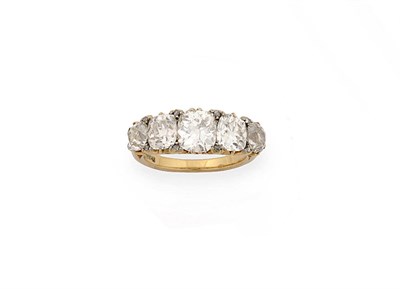 Lot 222 - A Victorian Diamond Five Stone Ring, the graduated old cut diamonds spaced by pairs of tiny...