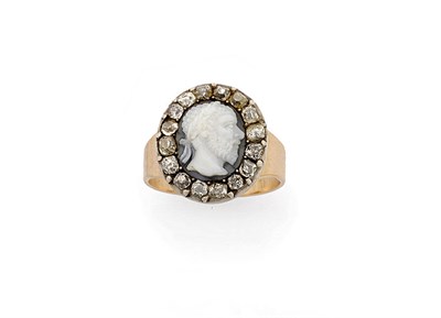 Lot 226 - A Diamond and Cameo Ring, a carved cameo depicting a classical portrait of a man is bordered by old