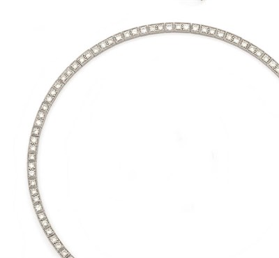 Lot 230 - A Diamond Collarette Necklace, circa 1930, the articulated necklace features pairs of round...