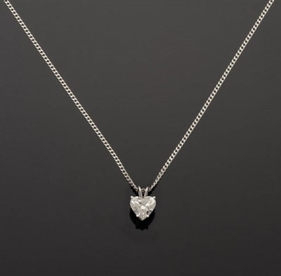 Lot 243 - An 18 Carat White Gold Heart Shaped Solitaire Diamond Pendant on Chain, the diamond held in a...