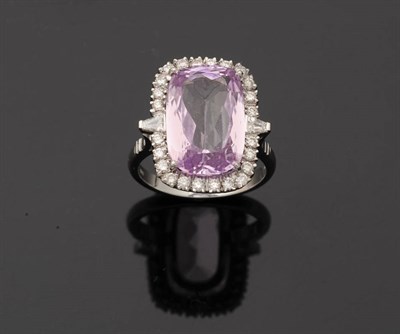 Lot 252 - An 18 Carat White Gold Kunzite and Diamond Cluster Ring, the kunzite is flanked by a tapered...