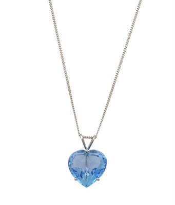 Lot 264 - A Blue Topaz Heart Shaped Pendant on Chain, the faceted topaz in a three claw setting hangs on...