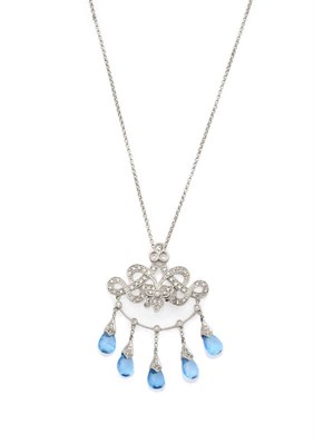 Lot 265 - A Blue Topaz and Diamond Chandelier Pendant on Chain, five briolette cut blue topaz suspend...