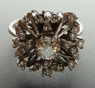 Lot 275 - A Diamond Cluster Ring, round brilliant cut diamonds in a squared cluster form with open...