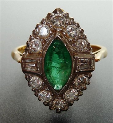 Lot 290 - An Emerald and Diamond Cluster Ring, a marquise cut emerald in a white rubover setting to...