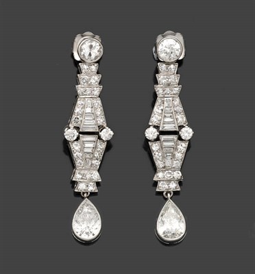 Lot 317 - A Pair of Art Deco Style Drop Earrings, a round brilliant cut diamond stud suspends a diamond...