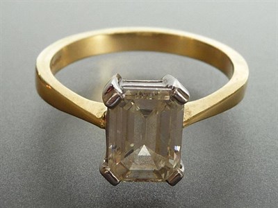 Lot 326 - An 18 Carat Gold Emerald-Cut Diamond Solitaire Ring, the diamond in a white four claw setting, to a