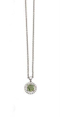 Lot 334 - A Demantoid Garnet and Diamond Pendant on Chain, a round brilliant cut demantoid garnet in a...