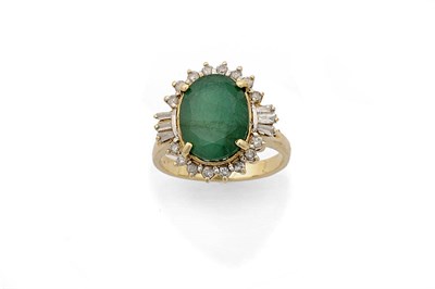 Lot 337 - A 9 Carat Gold Emerald and Diamond Cluster Ring, the oval cut emerald sits above a gallery of round