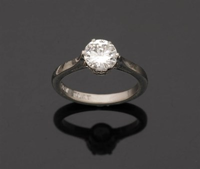 Lot 347 - A Diamond Solitaire Ring, the round brilliant cut diamond held in a six claw white coronet...