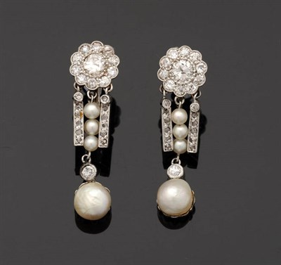 Lot 351 - A Pair of Diamond and Pearl Drop Earrings, a diamond cluster suspends a pearl and diamond set...