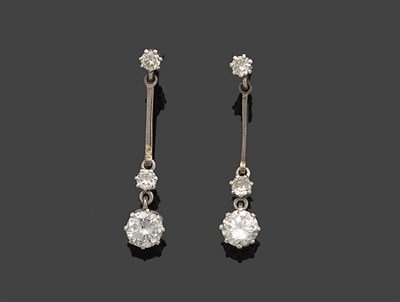 Lot 361 - A Pair of Diamond Drop Earrings, a round brilliant cut diamond solitaire stud suspends a plain...