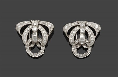 Lot 362 - An Art Deco Diamond Set Double Clip Brooch, the two panels modelled as tiered curved forms, set...